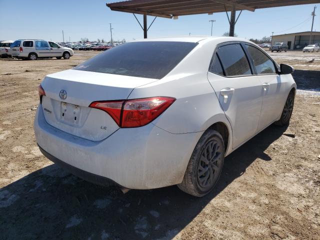 Photo 3 VIN: 5YFBURHE8HP698490 - TOYOTA COROLLA L 