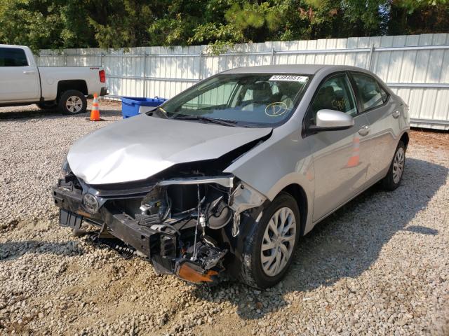 Photo 1 VIN: 5YFBURHE8HP709004 - TOYOTA COROLLA L 