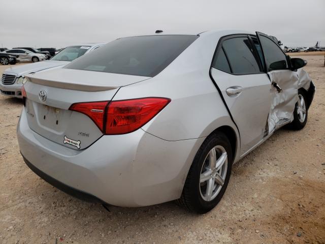 Photo 3 VIN: 5YFBURHE8HP714459 - TOYOTA COROLLA L 