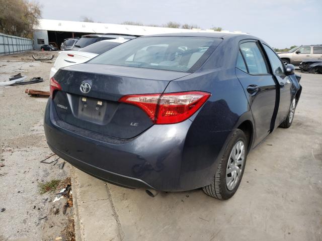 Photo 3 VIN: 5YFBURHE8HP729317 - TOYOTA COROLLA L 