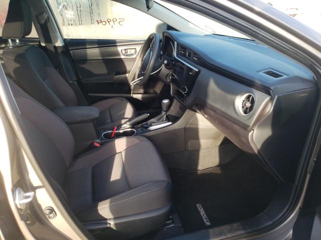 Photo 4 VIN: 5YFBURHE8HP734887 - TOYOTA COROLLA L 