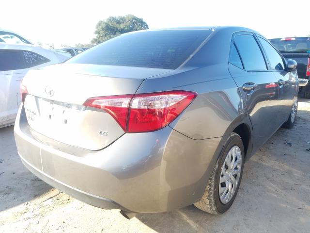 Photo 3 VIN: 5YFBURHE8JP743031 - TOYOTA COROLLA L 