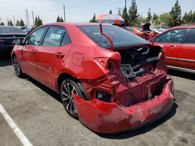 Photo 2 VIN: 5YFBURHE8JP761870 - TOYOTA COROLLA L 