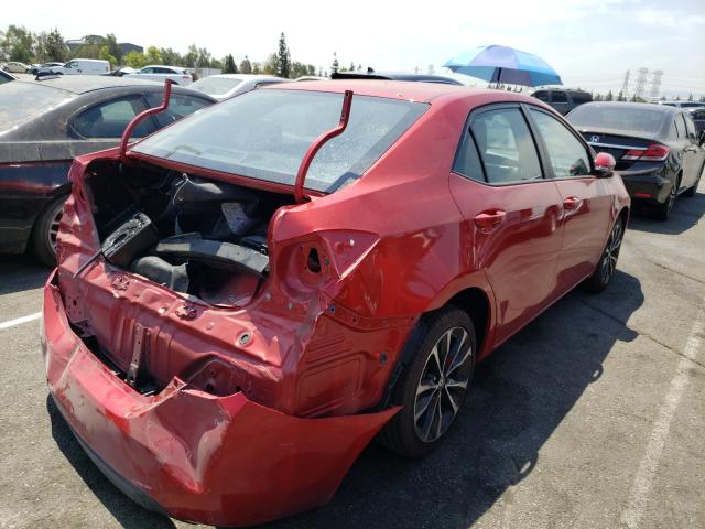 Photo 3 VIN: 5YFBURHE8JP761870 - TOYOTA COROLLA L 