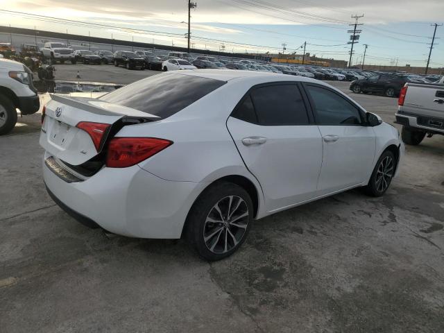 Photo 2 VIN: 5YFBURHE8JP762744 - TOYOTA COROLLA L 