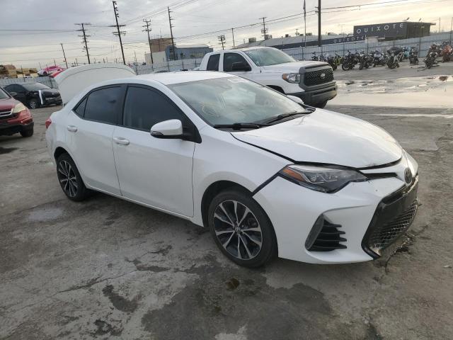 Photo 3 VIN: 5YFBURHE8JP762744 - TOYOTA COROLLA L 