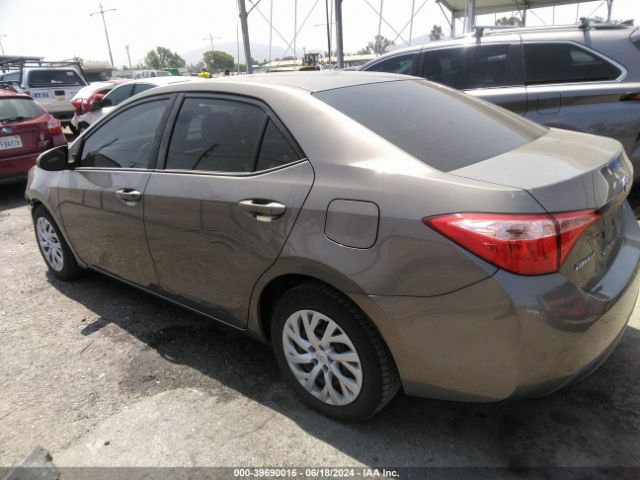 Photo 2 VIN: 5YFBURHE8JP778829 - TOYOTA COROLLA 