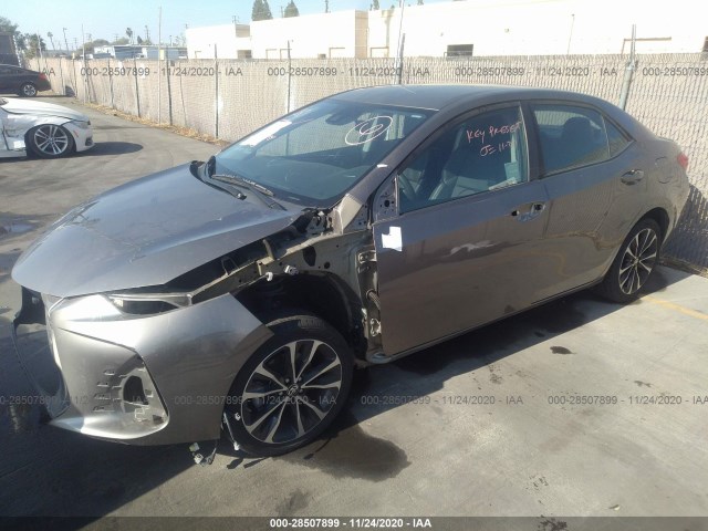 Photo 1 VIN: 5YFBURHE8JP782704 - TOYOTA COROLLA 