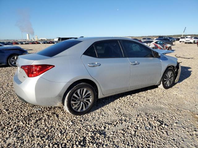 Photo 2 VIN: 5YFBURHE8JP785151 - TOYOTA COROLLA L 