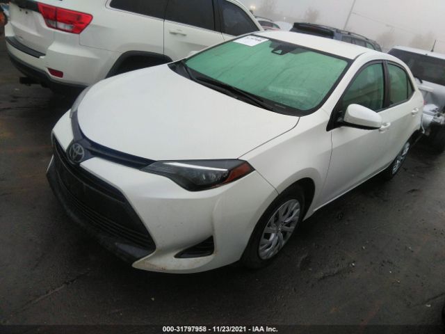 Photo 1 VIN: 5YFBURHE8JP798790 - TOYOTA COROLLA 