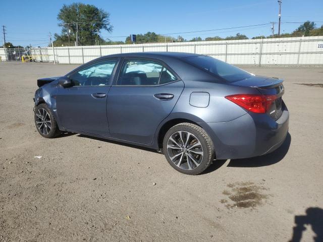 Photo 1 VIN: 5YFBURHE8JP801865 - TOYOTA COROLLA L 