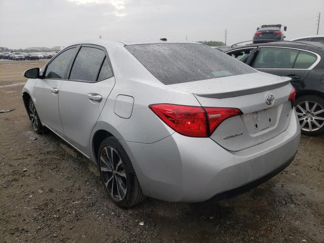 Photo 2 VIN: 5YFBURHE8JP806967 - TOYOTA COROLLA L 