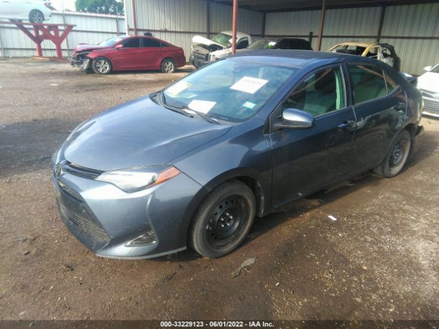 Photo 1 VIN: 5YFBURHE8JP810470 - TOYOTA COROLLA 