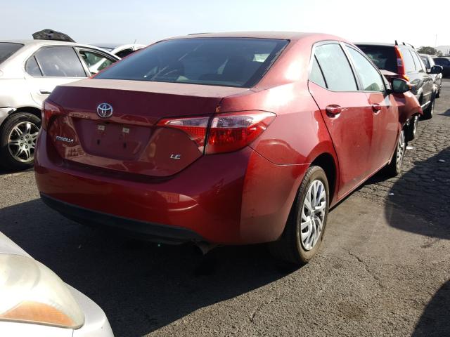 Photo 3 VIN: 5YFBURHE8JP813661 - TOYOTA COROLLA L 