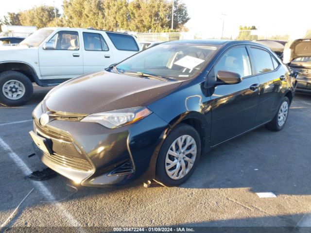 Photo 1 VIN: 5YFBURHE8JP815135 - TOYOTA COROLLA 