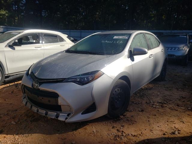 Photo 1 VIN: 5YFBURHE8JP815216 - TOYOTA COROLLA L 