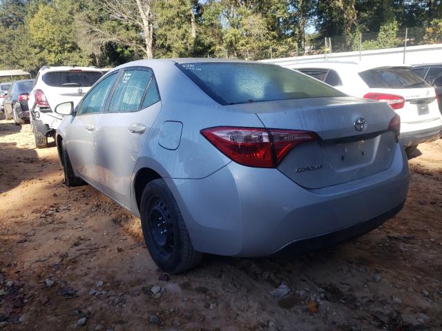 Photo 2 VIN: 5YFBURHE8JP815216 - TOYOTA COROLLA L 