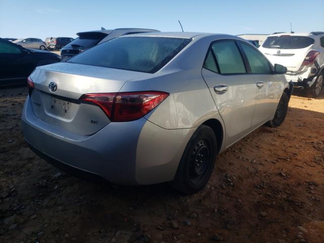 Photo 3 VIN: 5YFBURHE8JP815216 - TOYOTA COROLLA L 