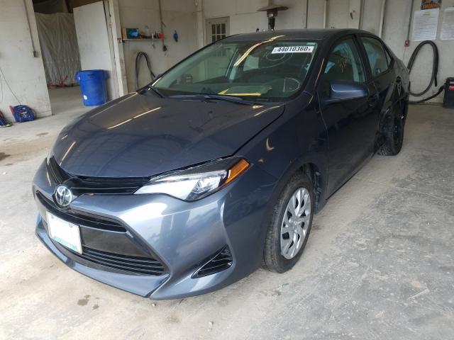 Photo 1 VIN: 5YFBURHE8JP817855 - TOYOTA COROLLA L 