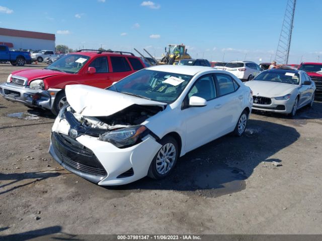 Photo 1 VIN: 5YFBURHE8JP825356 - TOYOTA COROLLA 