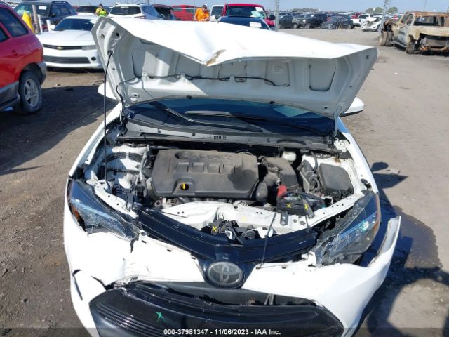 Photo 9 VIN: 5YFBURHE8JP825356 - TOYOTA COROLLA 