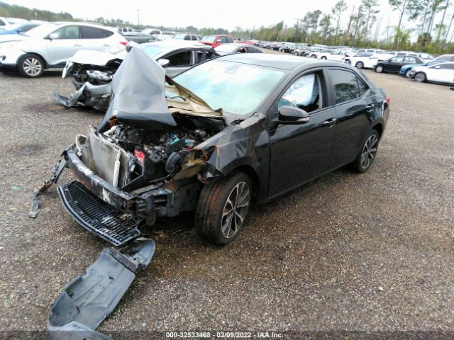 Photo 1 VIN: 5YFBURHE8JP841217 - TOYOTA COROLLA 