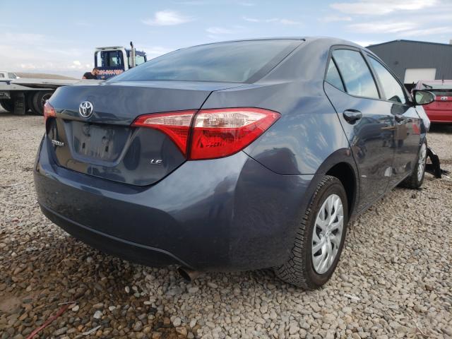 Photo 3 VIN: 5YFBURHE8JP849477 - TOYOTA COROLLA L 