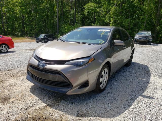 Photo 1 VIN: 5YFBURHE8JP849835 - TOYOTA COROLLA L 