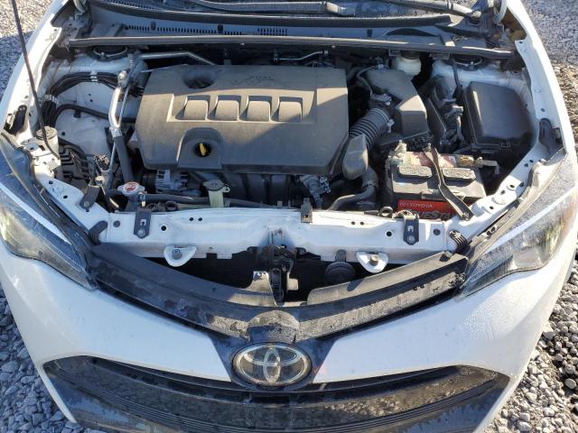 Photo 10 VIN: 5YFBURHE8JP854999 - TOYOTA COROLLA L 