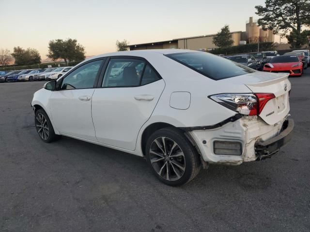 Photo 1 VIN: 5YFBURHE8KP856379 - TOYOTA COROLLA L 