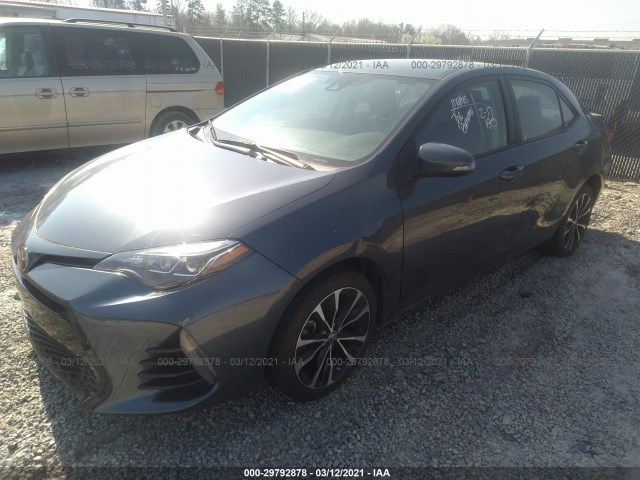 Photo 1 VIN: 5YFBURHE8KP857032 - TOYOTA COROLLA 