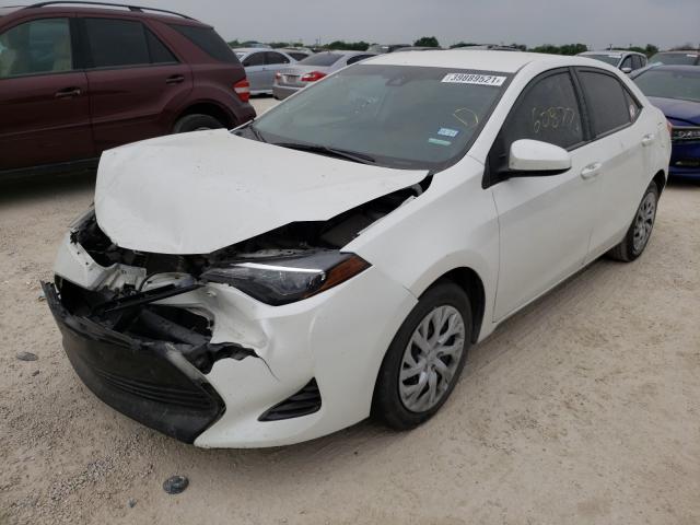 Photo 1 VIN: 5YFBURHE8KP857113 - TOYOTA COROLLA L 