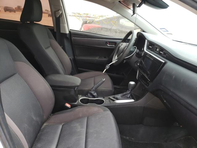 Photo 4 VIN: 5YFBURHE8KP857113 - TOYOTA COROLLA L 