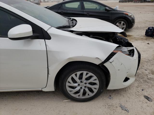 Photo 8 VIN: 5YFBURHE8KP857113 - TOYOTA COROLLA L 