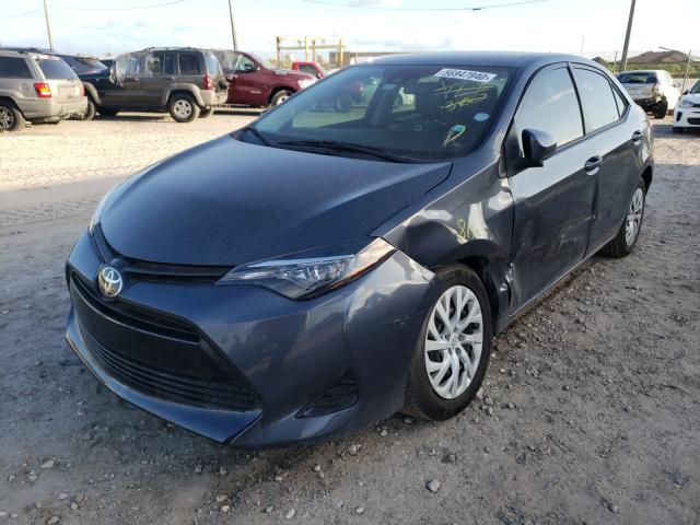 Photo 1 VIN: 5YFBURHE8KP858522 - TOYOTA COROLLA L 