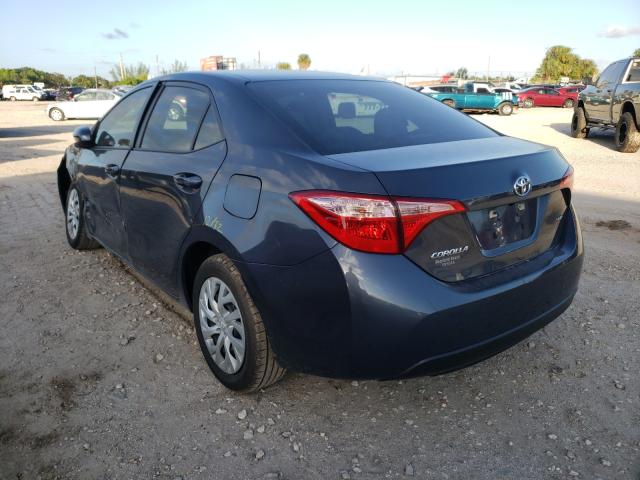 Photo 2 VIN: 5YFBURHE8KP858522 - TOYOTA COROLLA L 