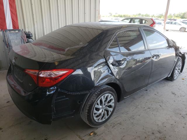 Photo 3 VIN: 5YFBURHE8KP858553 - TOYOTA COROLLA L 