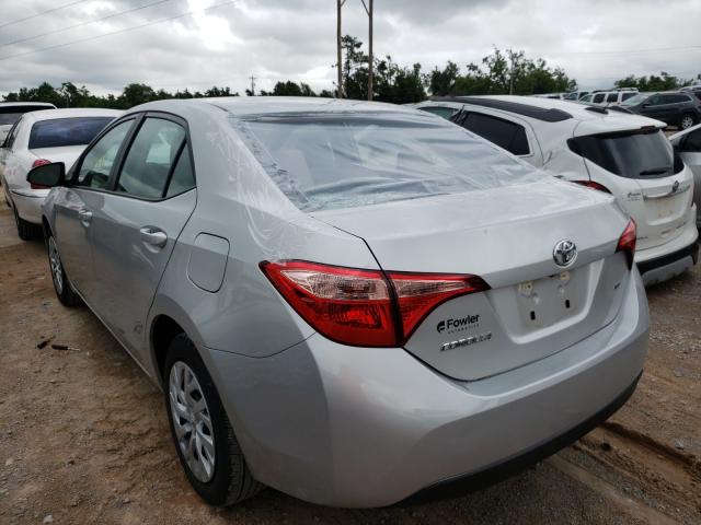 Photo 2 VIN: 5YFBURHE8KP859847 - TOYOTA COROLLA L 