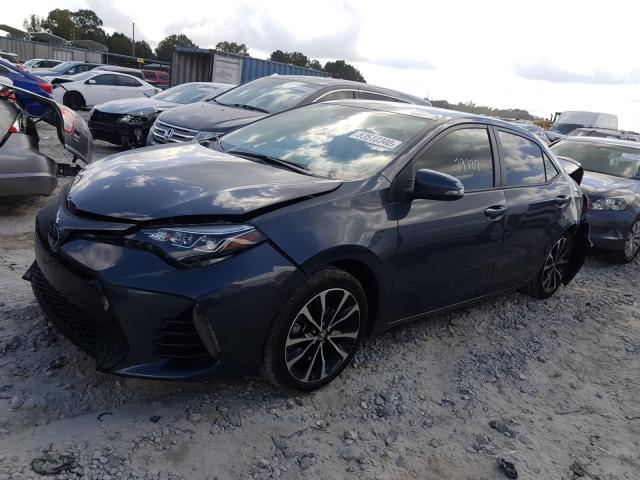 Photo 1 VIN: 5YFBURHE8KP862652 - TOYOTA COROLLA L 