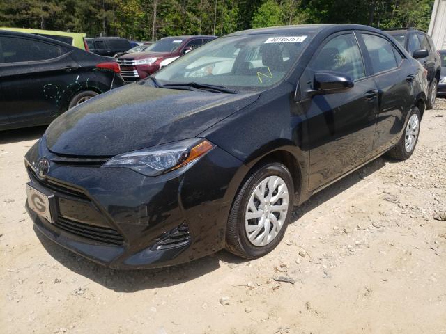 Photo 1 VIN: 5YFBURHE8KP864076 - TOYOTA COROLLA L 