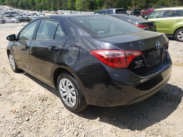 Photo 2 VIN: 5YFBURHE8KP864076 - TOYOTA COROLLA L 