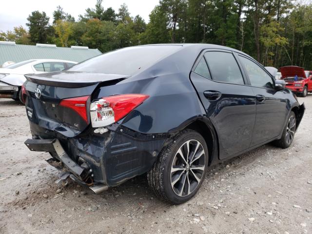 Photo 3 VIN: 5YFBURHE8KP865146 - TOYOTA COROLLA L 