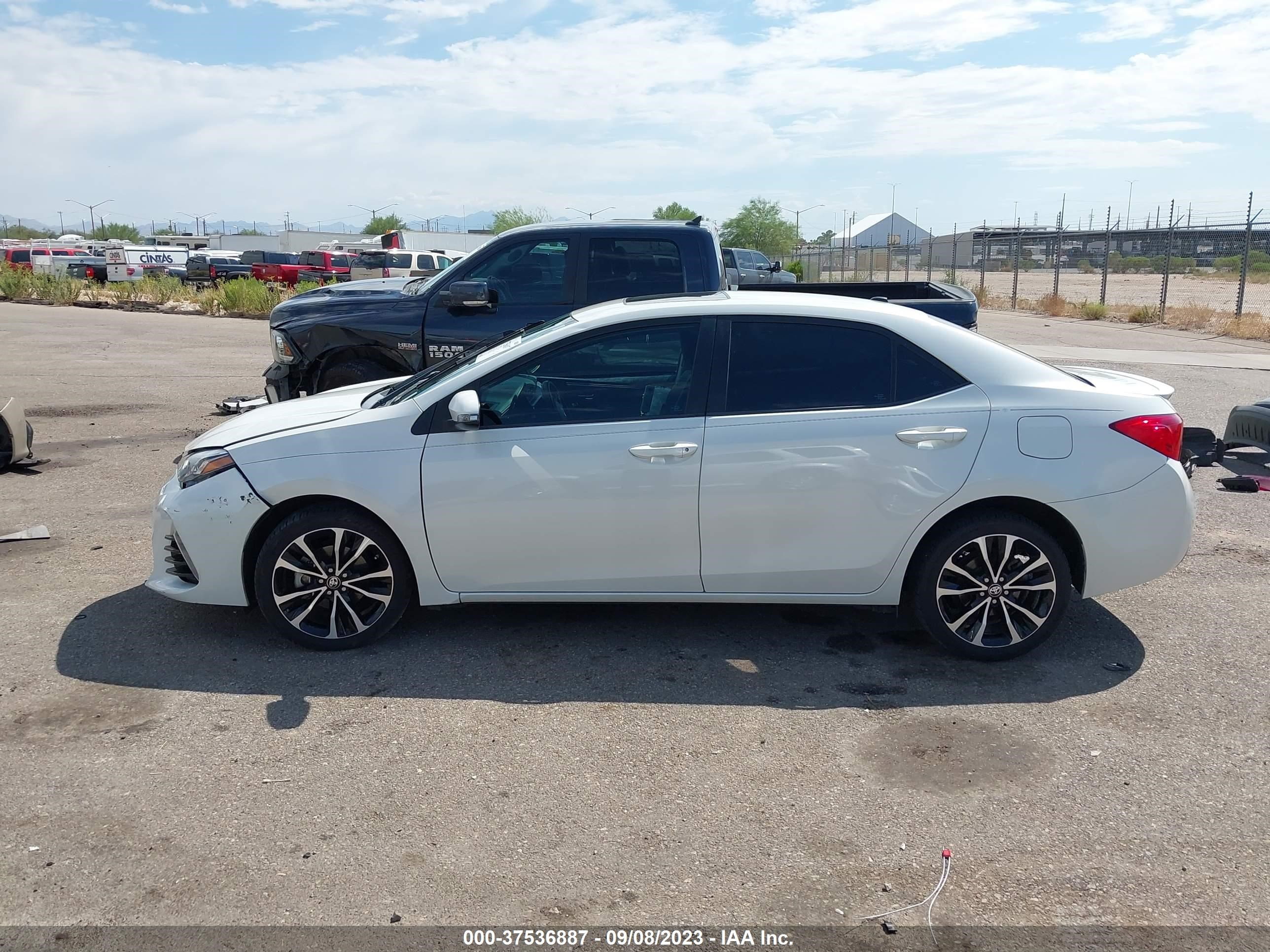 Photo 12 VIN: 5YFBURHE8KP868130 - TOYOTA COROLLA 