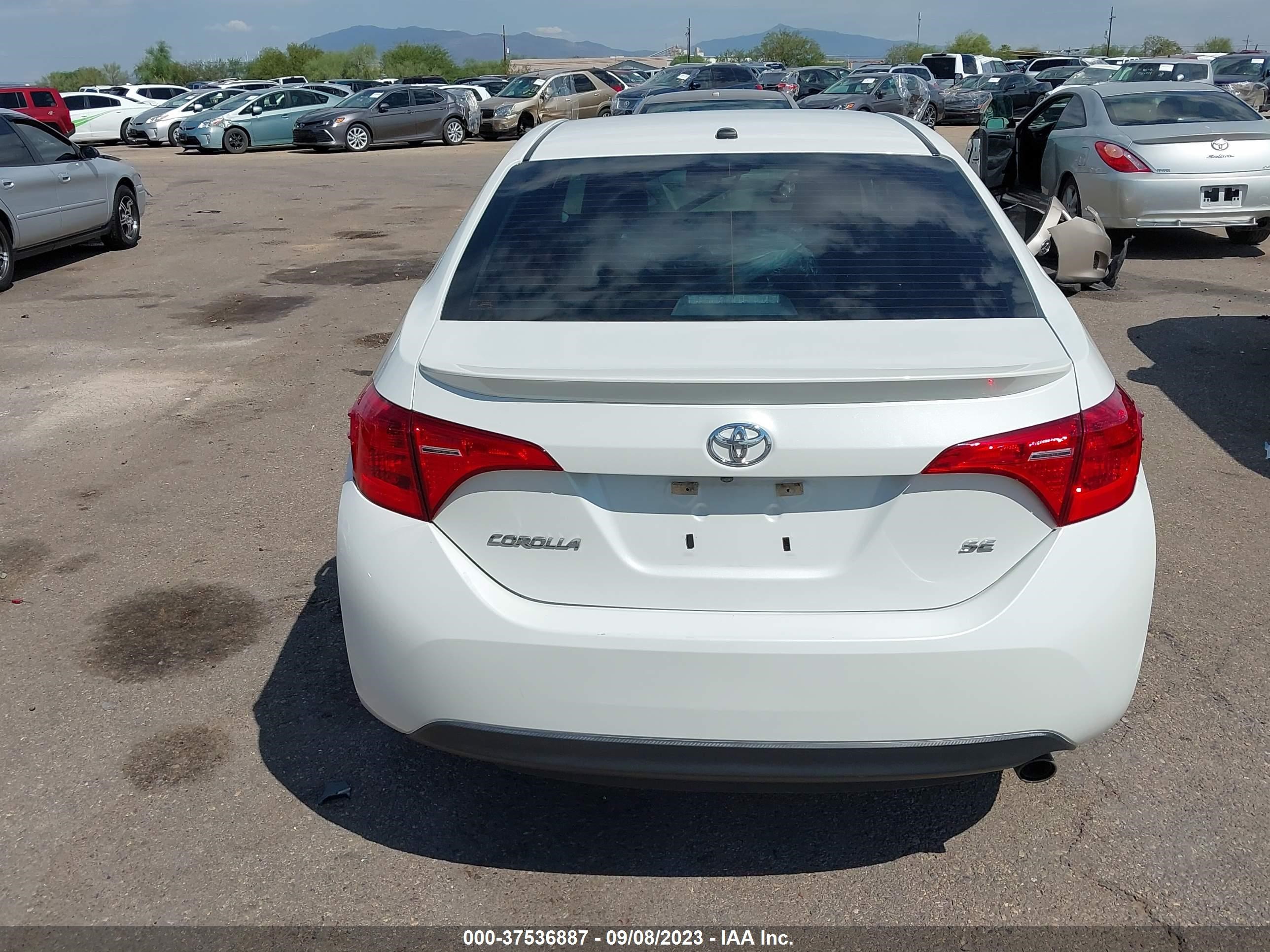 Photo 14 VIN: 5YFBURHE8KP868130 - TOYOTA COROLLA 