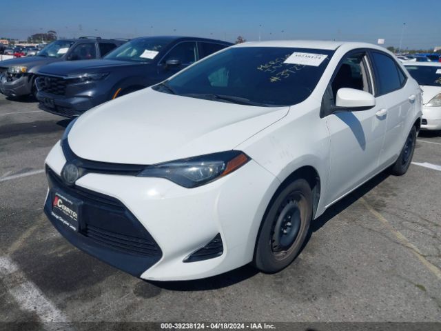 Photo 1 VIN: 5YFBURHE8KP869679 - TOYOTA COROLLA 