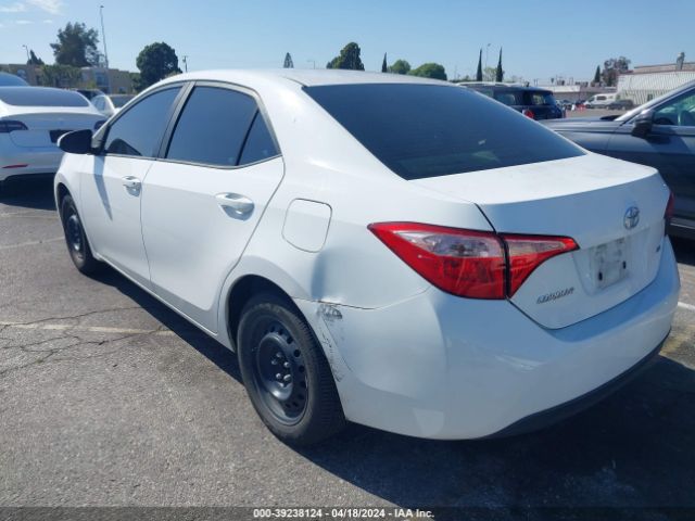 Photo 2 VIN: 5YFBURHE8KP869679 - TOYOTA COROLLA 