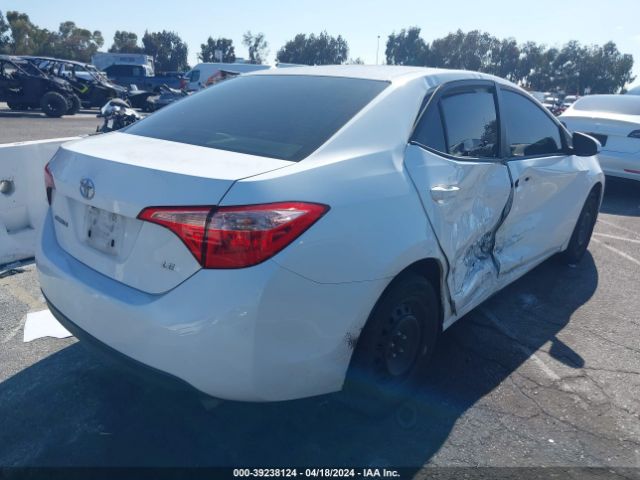 Photo 3 VIN: 5YFBURHE8KP869679 - TOYOTA COROLLA 