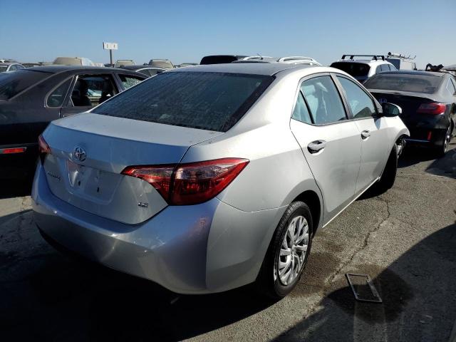 Photo 2 VIN: 5YFBURHE8KP873800 - TOYOTA COROLLA L 