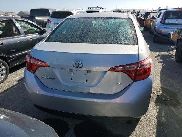 Photo 5 VIN: 5YFBURHE8KP873800 - TOYOTA COROLLA L 