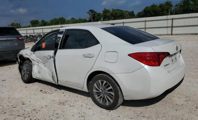 Photo 1 VIN: 5YFBURHE8KP877085 - TOYOTA COROLLA L 